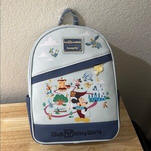 Loungefly Light Blue Disney World Backpack